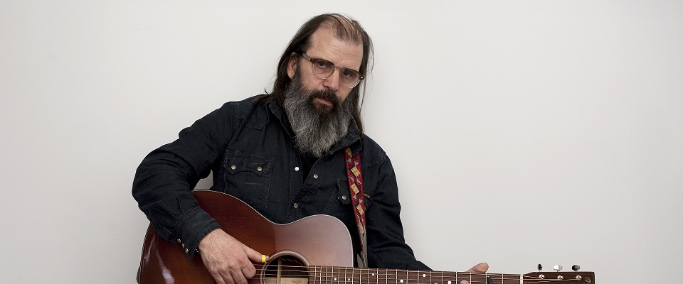 Steve Earle with Fred Kelly Pick in hand